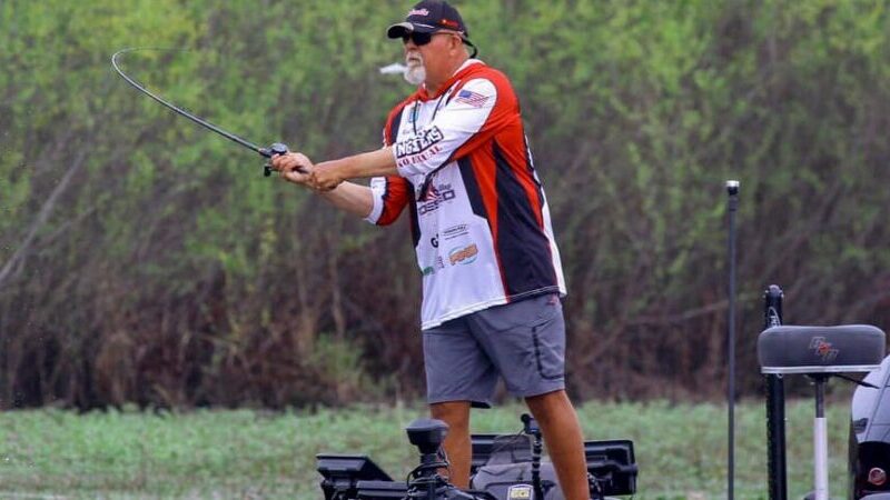 Boats docked at a picturesque marina on Black Lake after fishing